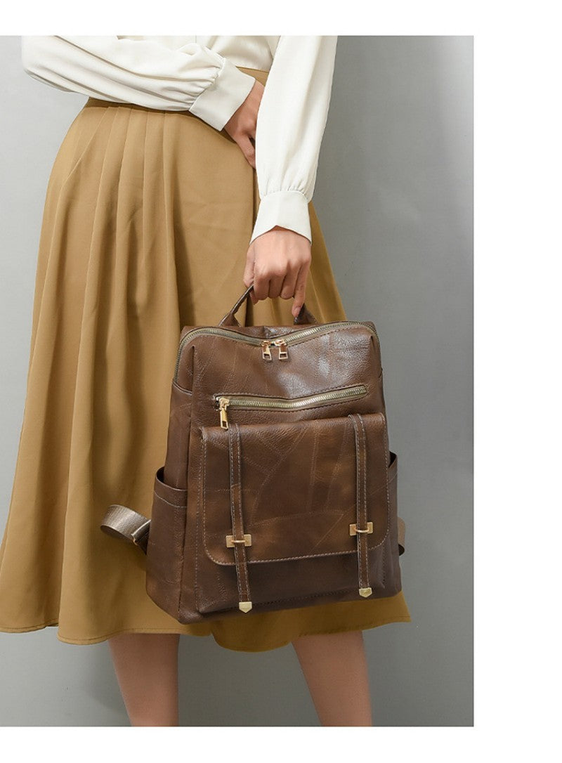 sac a dos femme porte par la poignee