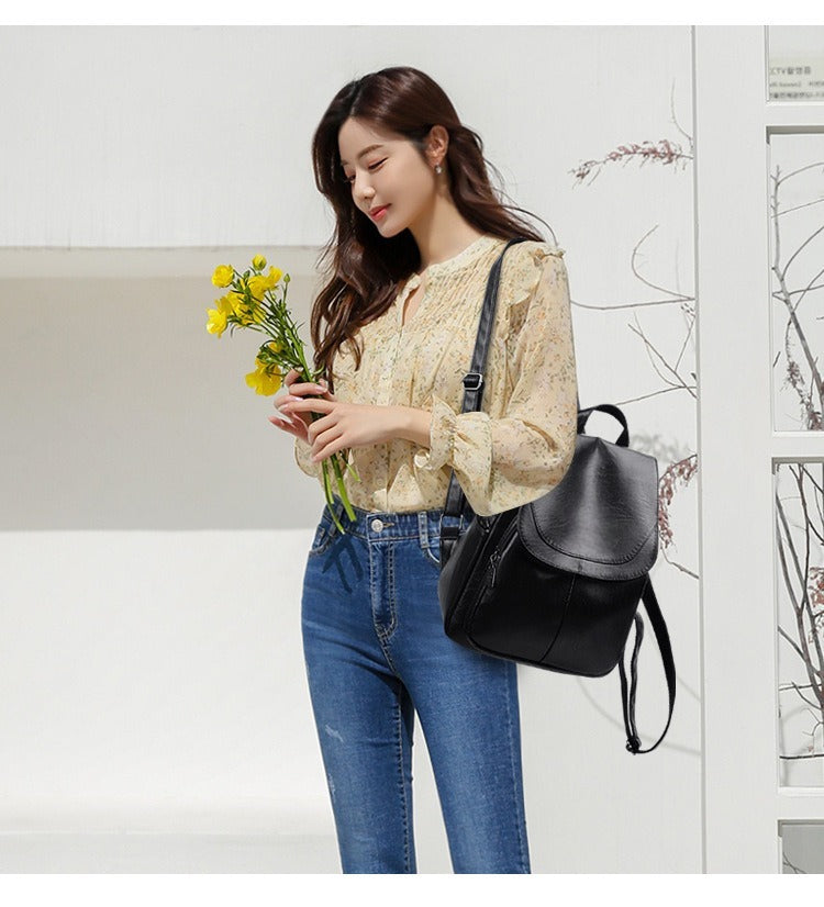 sac a dos femme noir porte des fleurs